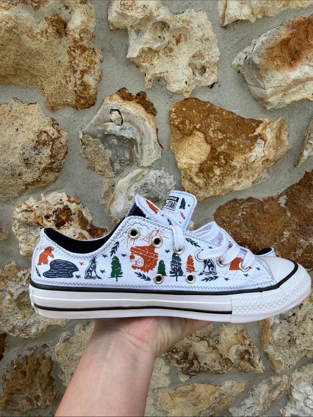 Converse Kids' camp print low tops kids size 5 women’s 7